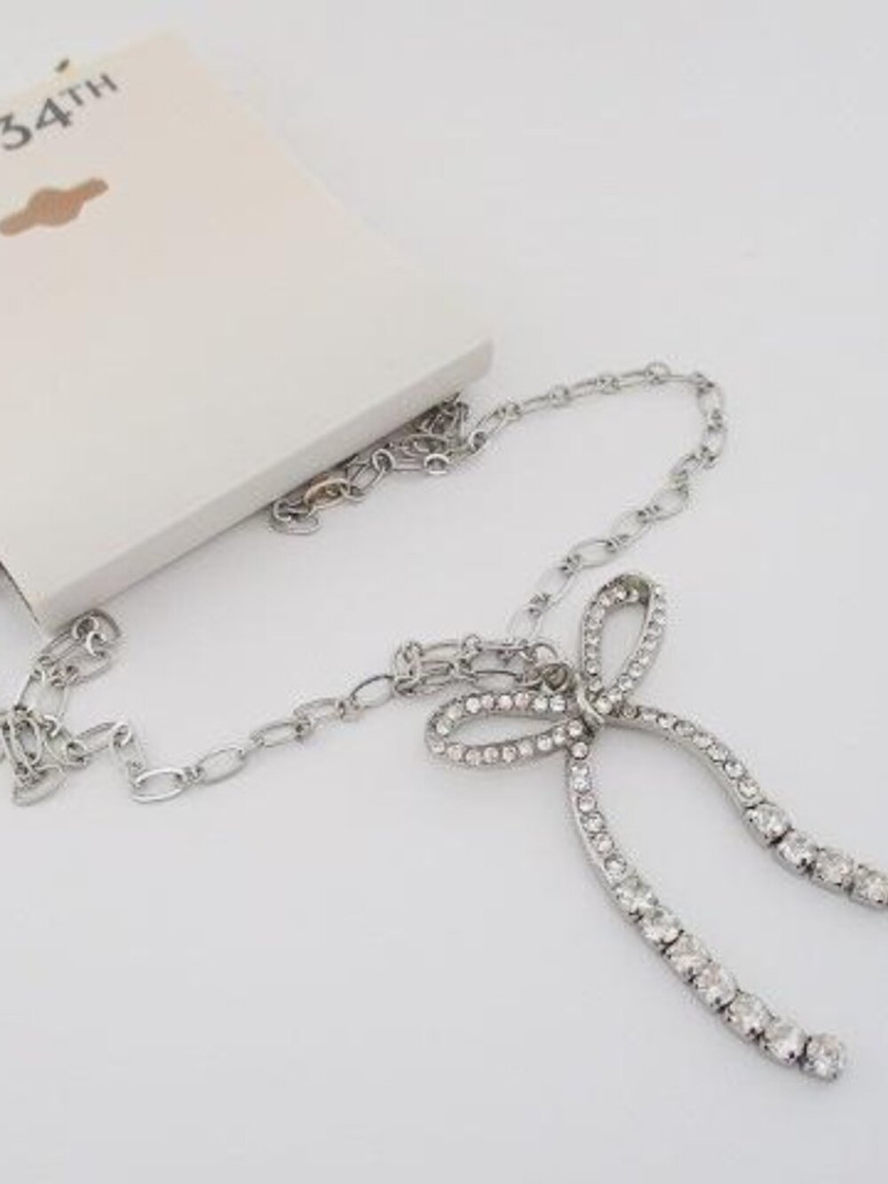 ON 34TH Silver Sparkling Bow Ribbon Statement Necklace NWT